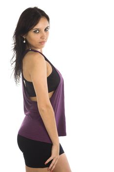 A sexy young hispanic woman wearing a gym outfit, isolated on a white background.