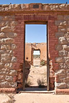 this doorway leads into some old ruins 