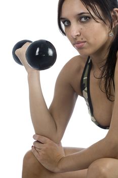 A sexy young hispanic woman wearing a gym outfit, isolated on a white background.