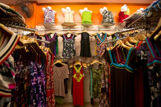 Clothes on the racks in female shop