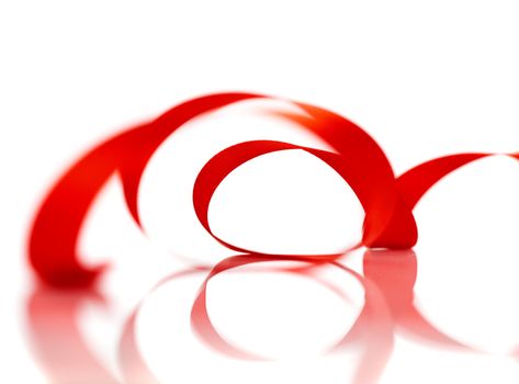 Red Christmas ribbon isolated on white background