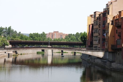 pictures of buildings and houses by the river