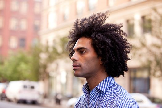 A portrait of a male in an urban setting