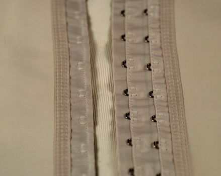 eyelets and hooks used in girdles and in corsets