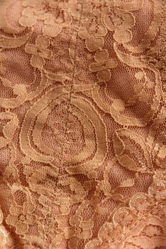 Pictures of a pretty and intricate design on a piece of clothing
