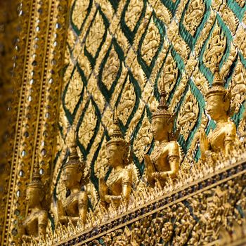 Ornamental wall in buddhist temple, Grand palace, Bangkok, Thailand