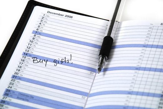 daily planner showing the time for buying gifts