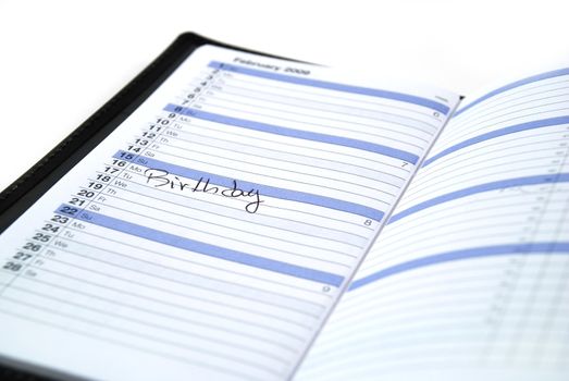 daily planner showing a birthday reminder in the month