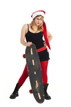 woman holding with a christmas dress holding a skateboard isolated on white
