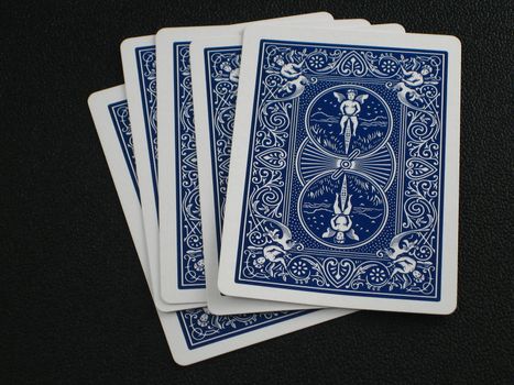 Pictures of various scenes depicting playing cards