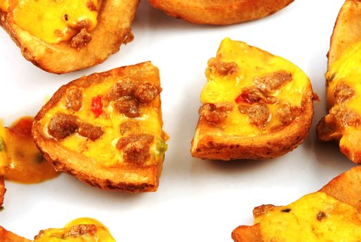 Stock pictures of potato skins loaded with chesse and bacon 