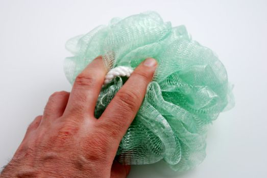 stock pictures of a green sponge for bath or shower