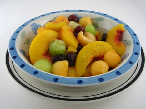 Bowl with different healthy and nutritious fruits