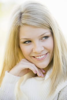 Portrait of a Pretty Blond Teen Girl Looking Away From Camera