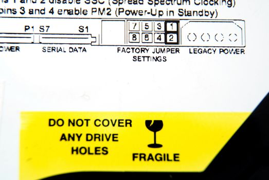 Pictures of the warning label in a computer hard drive