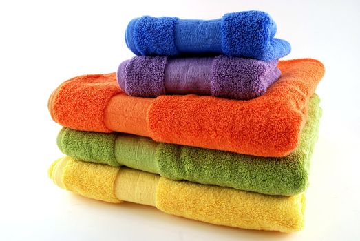 stock pictures of colorful bath towels stacked