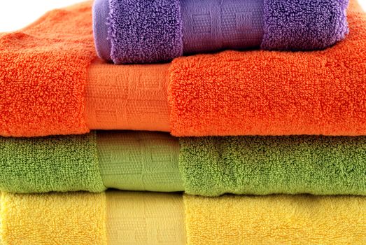 stock pictures of colorful bath towels stacked