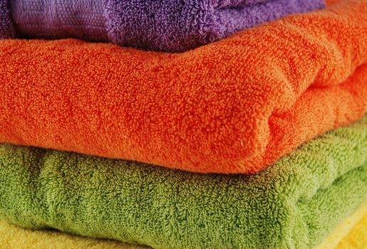 stock pictures of colorful bath towels stacked