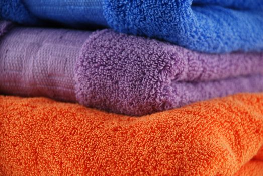 stock pictures of colorful bath towels stacked