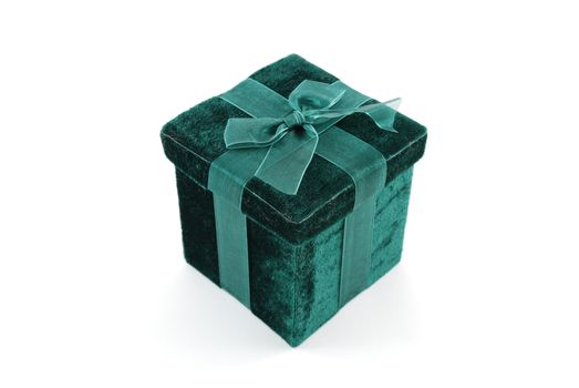 Green gift box with a laced up bow