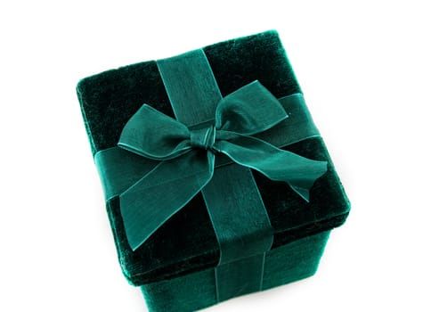 Green gift box with a laced up bow