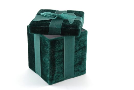 Green gift box with a laced up bow