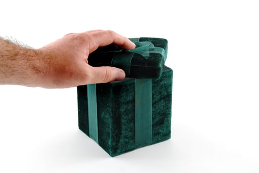 Green gift box with a laced up bow