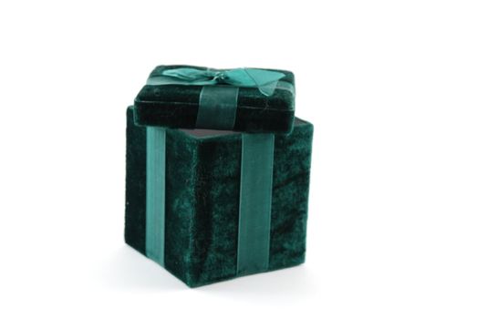 Green gift box with a laced up bow