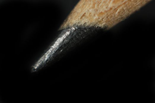 macro photo of a pen and pencil showing details