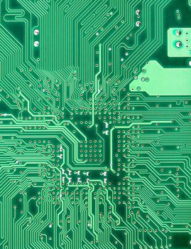 Background from electronic green circuit board close up