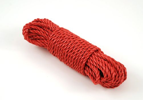 stock picture of a coil and loop of red rope