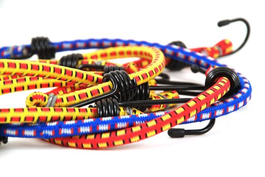 Stock pictures of bungee cords with steel hooks of several colors