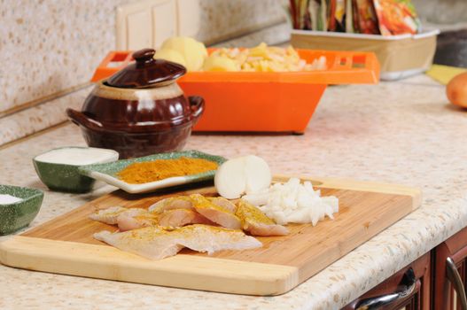 Meal preparation on kitchen from a fish