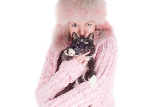 Beautiful woman in pink fur hat, isolated on white