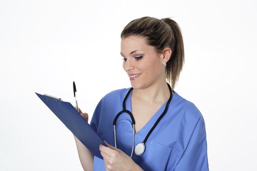 woman doctor with pen and stethoscope in studio