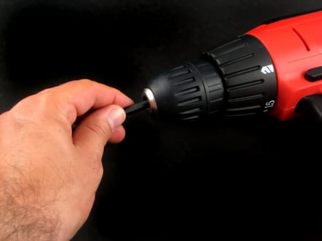 Pictures of a cordless, portable drill