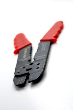 Stock picture of tool to cut and strip electrical wires for working purposes