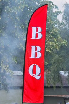 Large BBQ sign and smoke