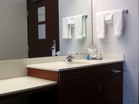 Pictures of the inside of a bathroom in a hotel room