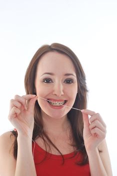 pretty girl flossing teeth