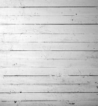 the background of weathered white painted wood