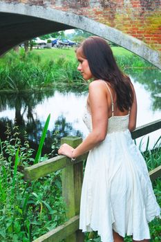 pretty girl looking over river