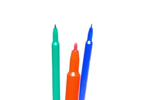 Color felt-tip pens photographed close up on a white background