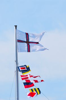 Naval flags flying in breeze