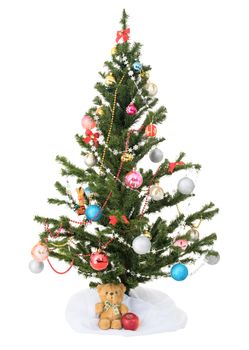 Decorated christmas tree with bear on a white background