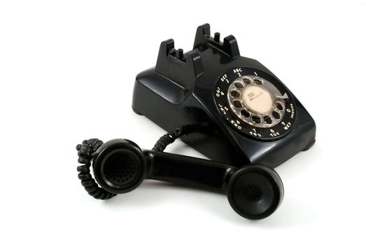 Pictures of an older, analog type telephone