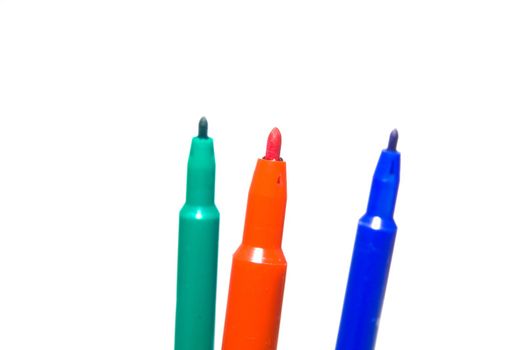 Color felt-tip pens photographed close up on a white background