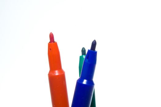 Color felt-tip pens photographed close up on a white background