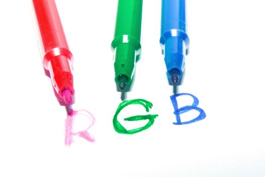 Color felt-tip pens photographed close up on a white background