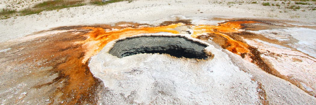 Beautiful colors of Ear Spring in Yellowstone National Park of Wyoming.